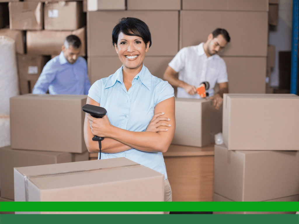 Small business owners reviewing ecommerce shipping orders
